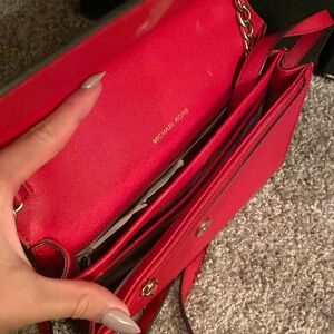 Red michael kors purse